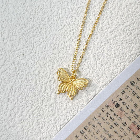 Golden Flutter – Filigree Butterfly Necklace