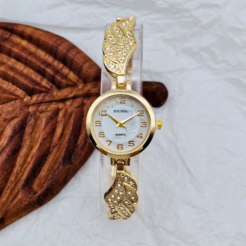Golden Aura – Crystal Wing Women’s Watch
