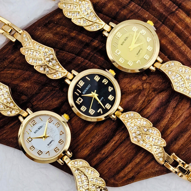 Golden Aura – Crystal Wing Women’s Watch