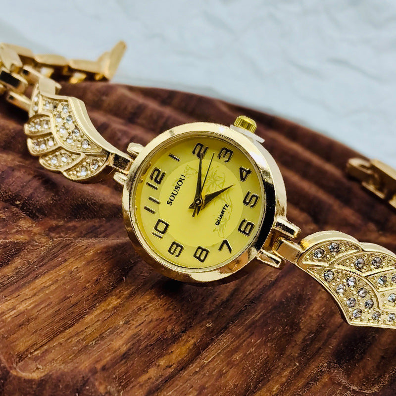 Golden Aura – Crystal Wing Women’s Watch