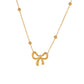 Golden Grace – Bow Pendant Necklace