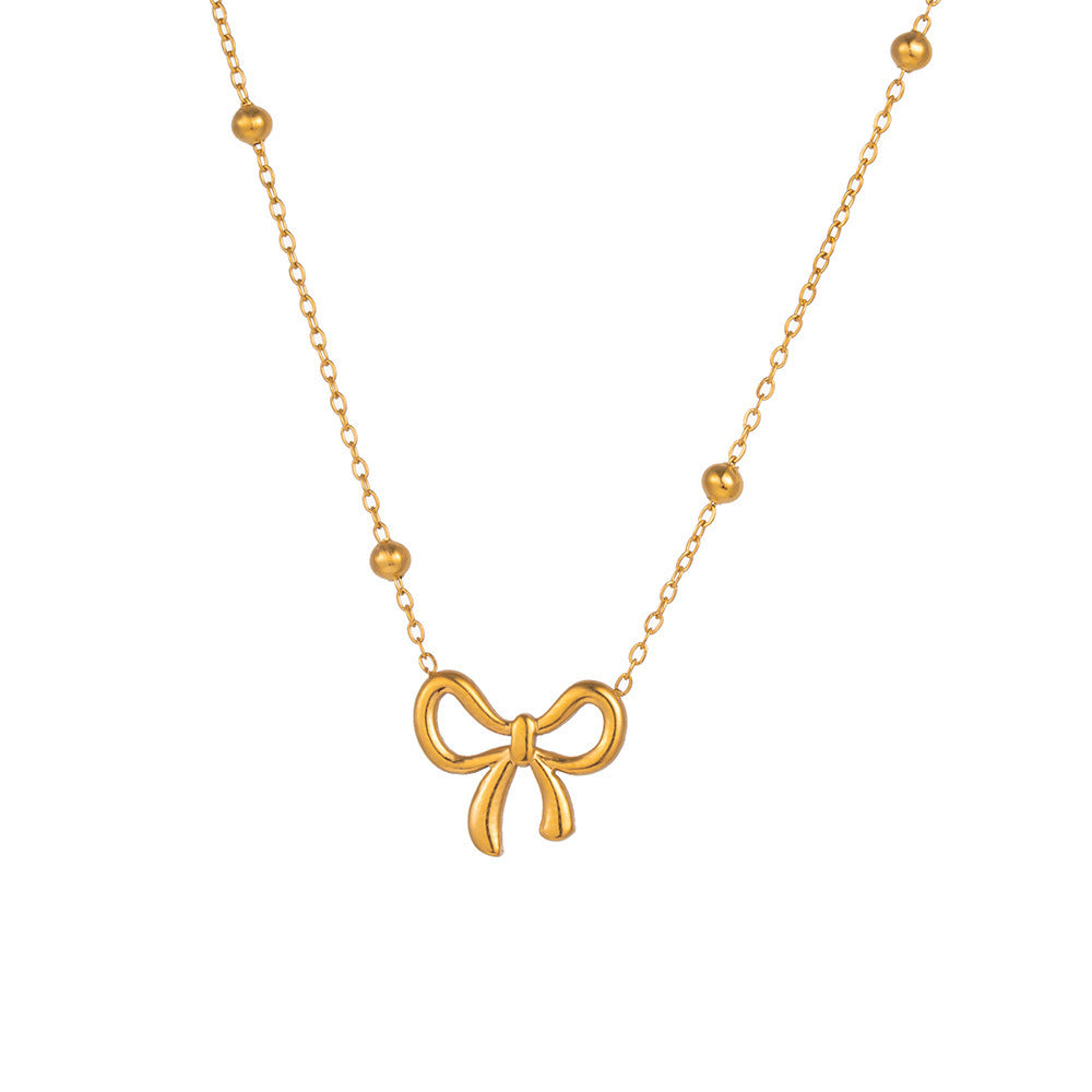 Golden Grace – Bow Pendant Necklace